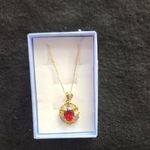 Elegant Gold Necklace with Red Pendant